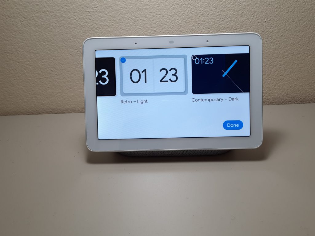 You can change the photo frame of your Nest Hub to a full screen clock.